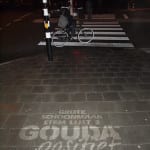 straatreclame in gouda met reverse graffiti