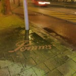 straatreclame met reverse graffiti coolsingel rotterdam